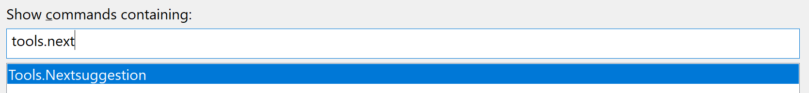 Screenshot of the "Show commands containing" search bar. The string "tools.next" is entered in the search field.